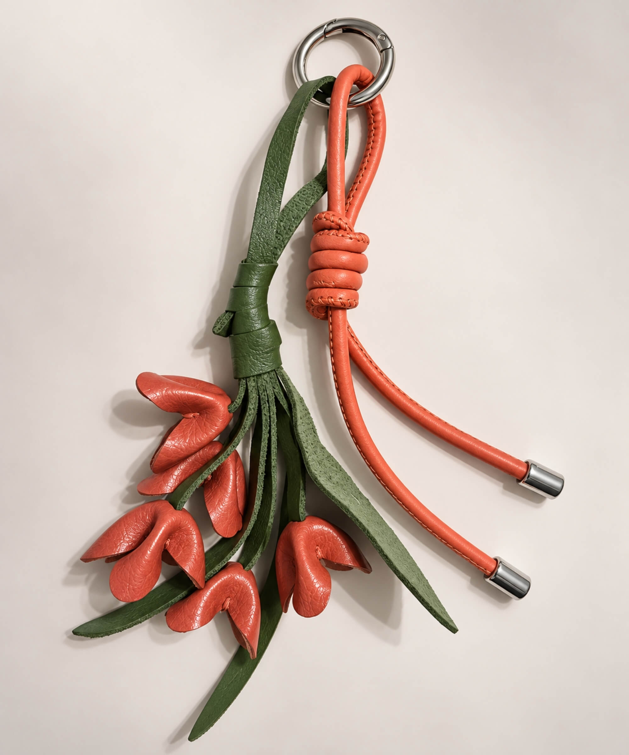 Orange floral PU leather bag charm keychain with long green leaves